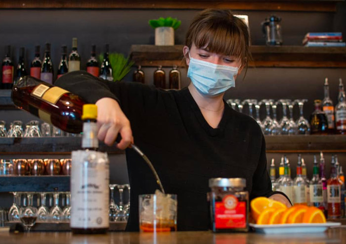 JavaVino Bartender Pouring an Old Fashioned